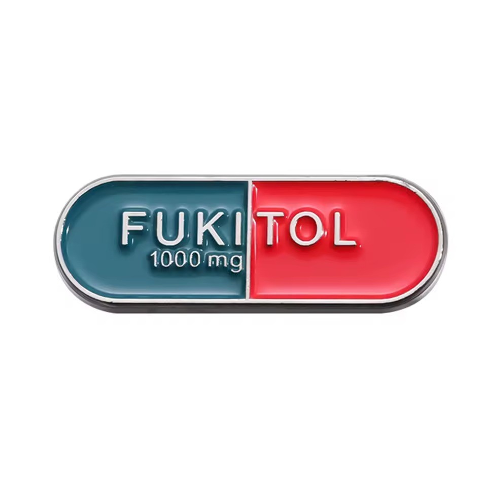 Пін медику Таблетка Fukitol різнокольоровий